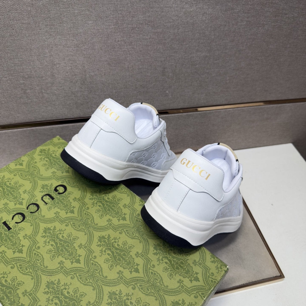Gucci Men's Embossed Low-Top Sneakers — front