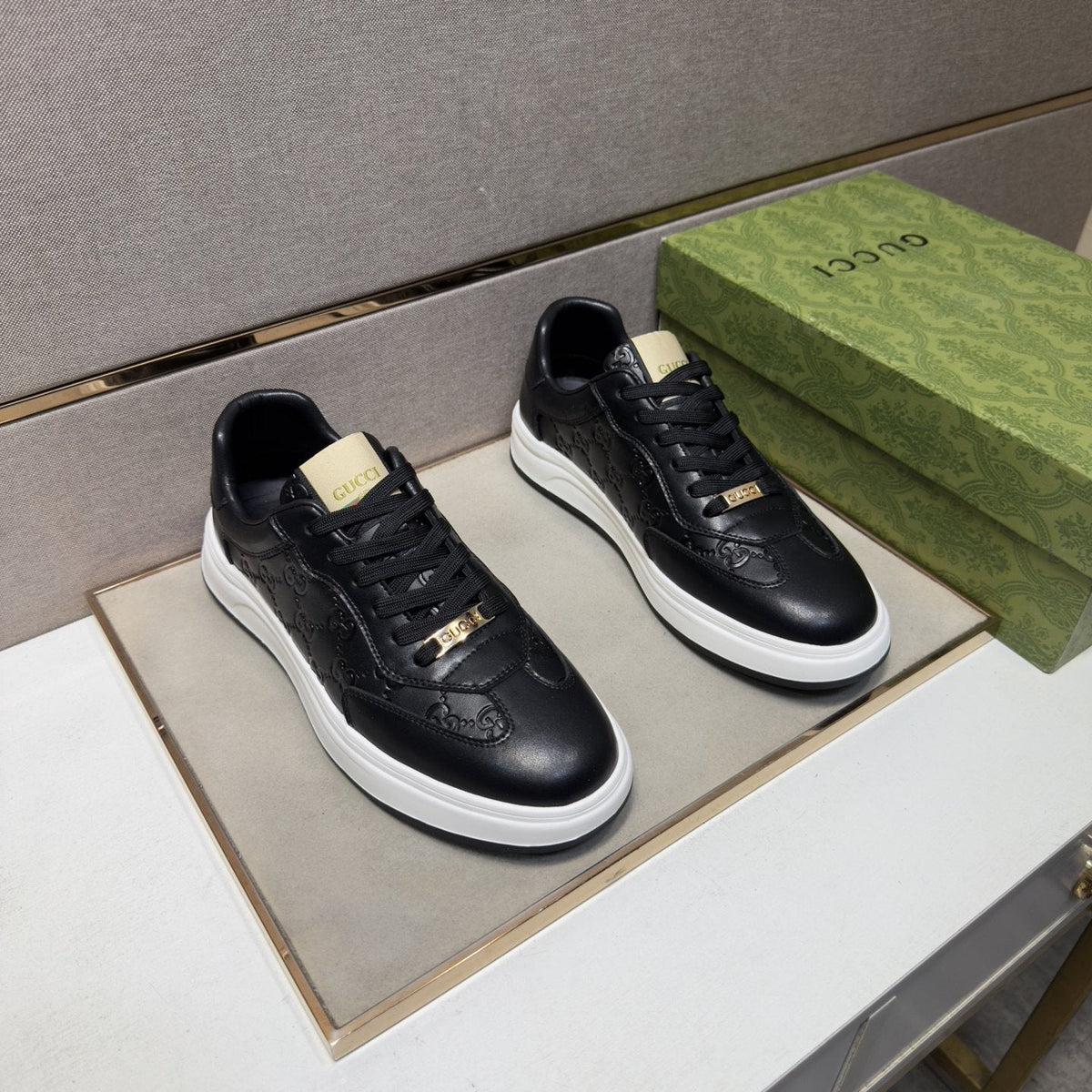 Gucci Men's Embossed Low-Top Sneakers — hero
