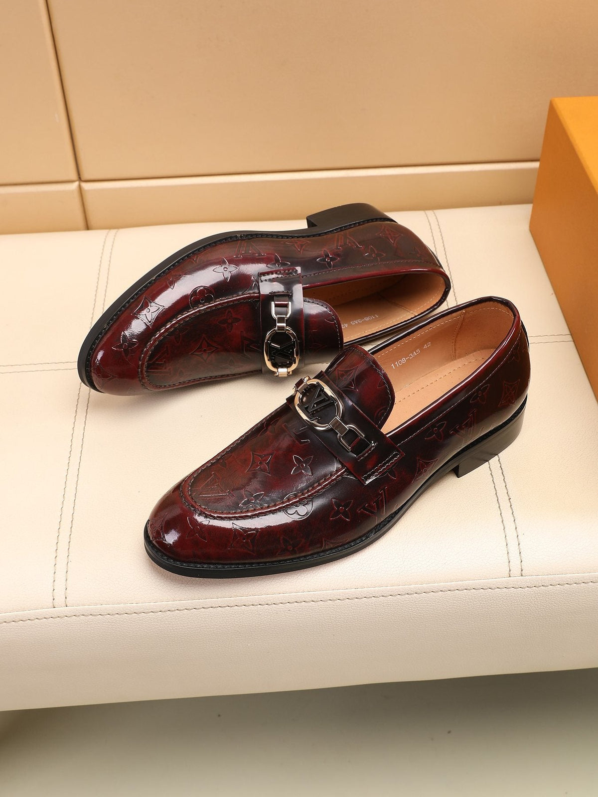 Louis Vuitton Embossed Bit Loafers — front