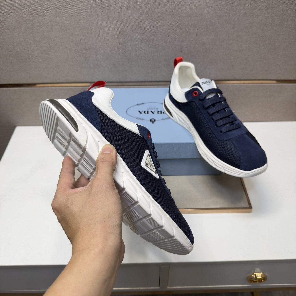 Prada Paneled Low-Top Sneakers — model