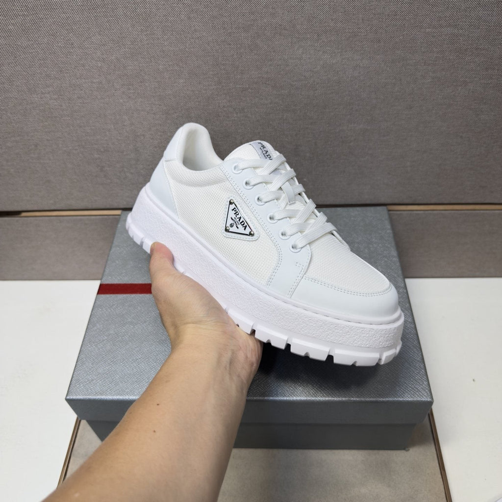 Prada Men's Paneled Low-Top Sneakers — model