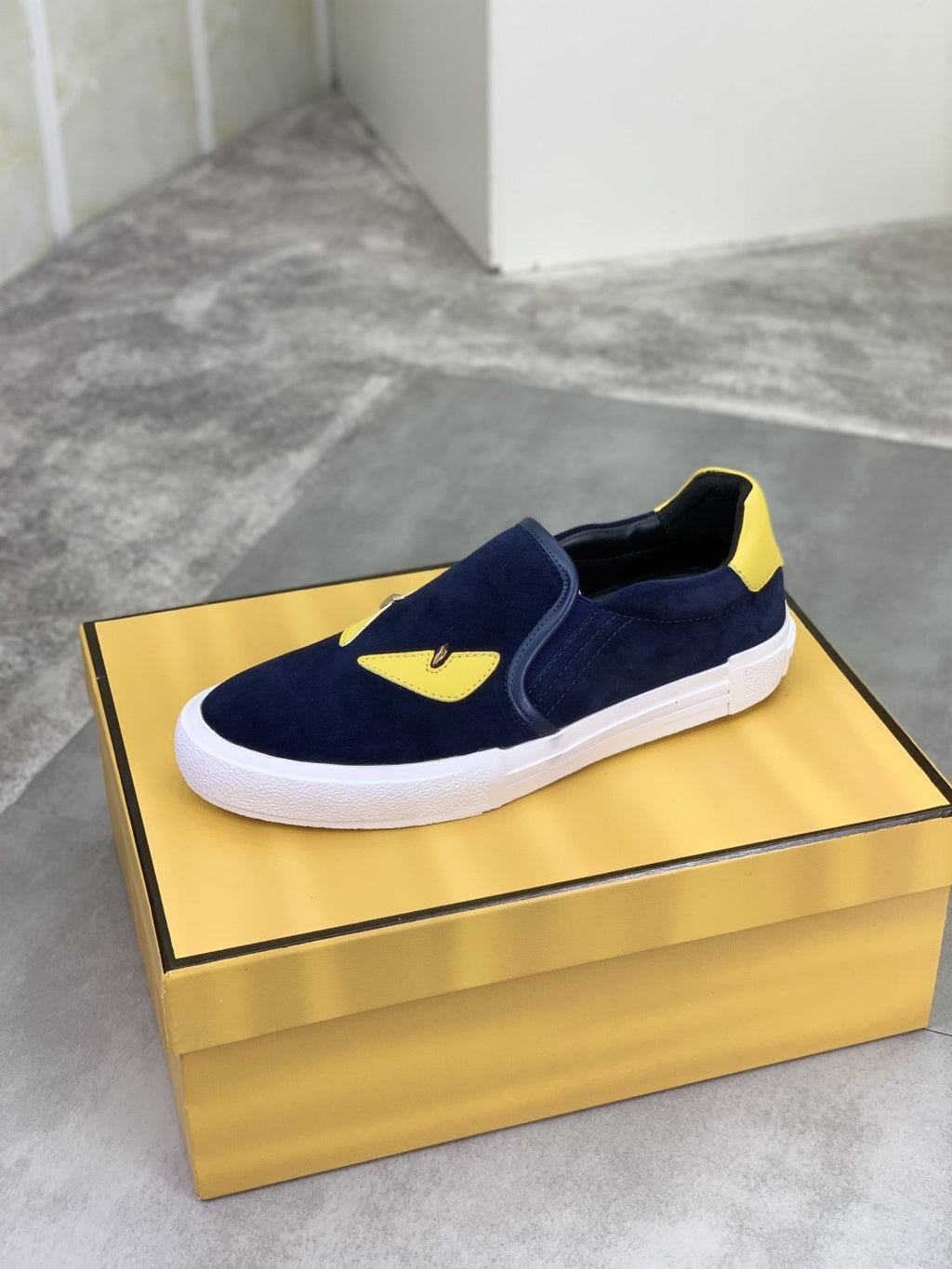Fendi Eye-Accent Slip-On Sneakers — side