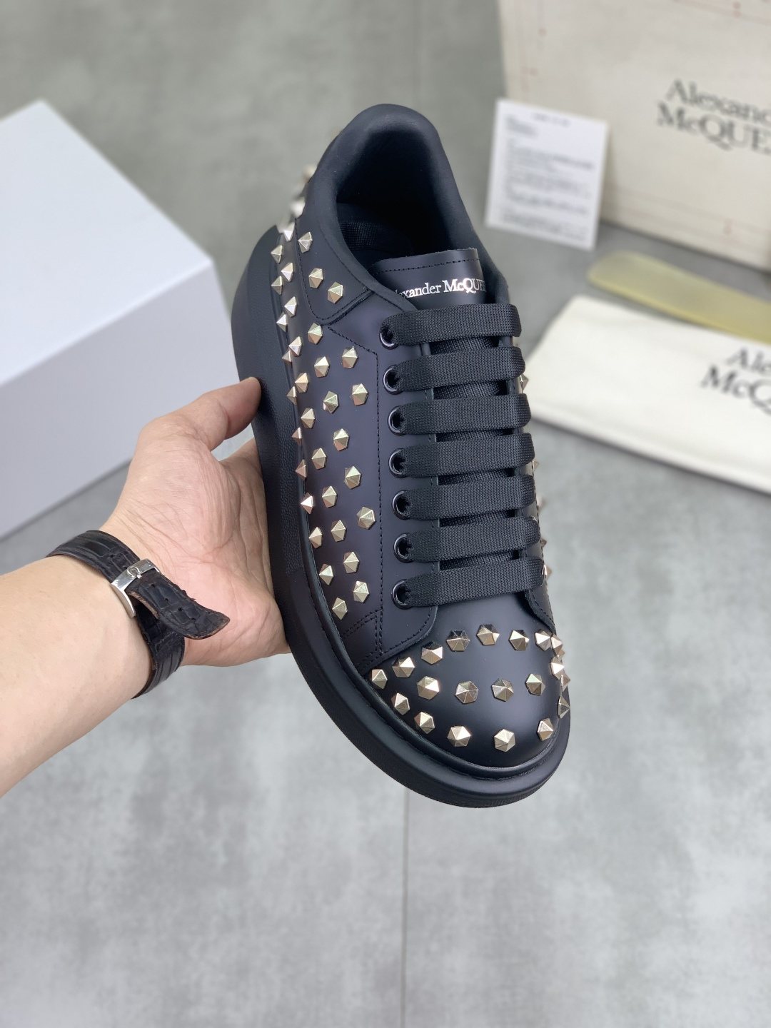 Alexander McQueen Black Studded Low-Top Sneakers — model
