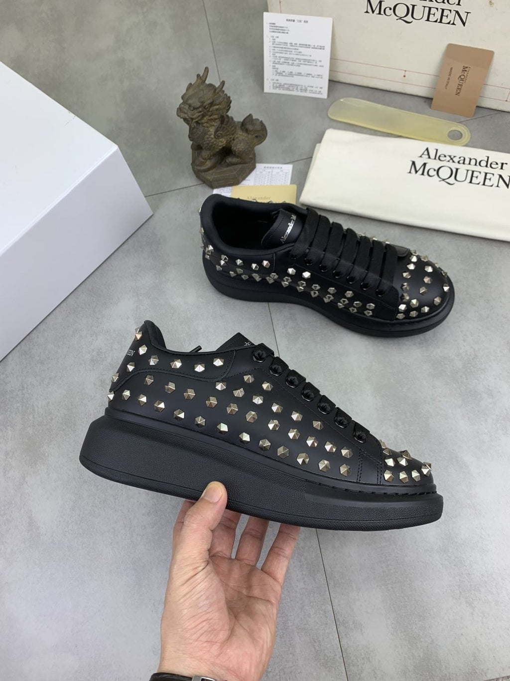 Alexander McQueen Black Studded Low-Top Sneakers — model