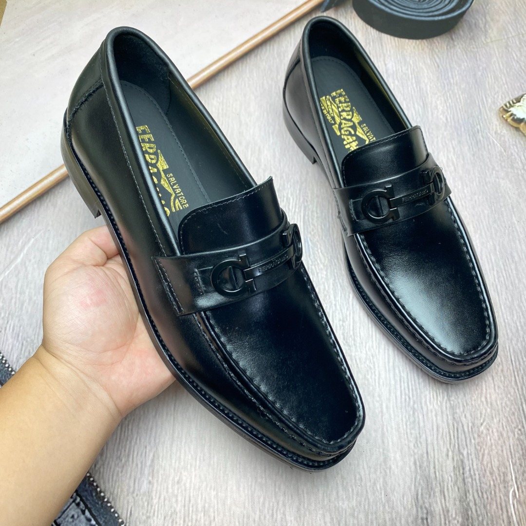 Ferragamo Black Metal-Accent Slip-On Loafers — model