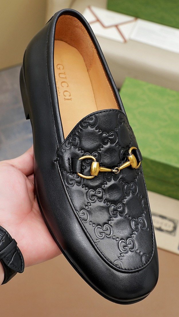 Gucci Black Embossed Loafers — hero