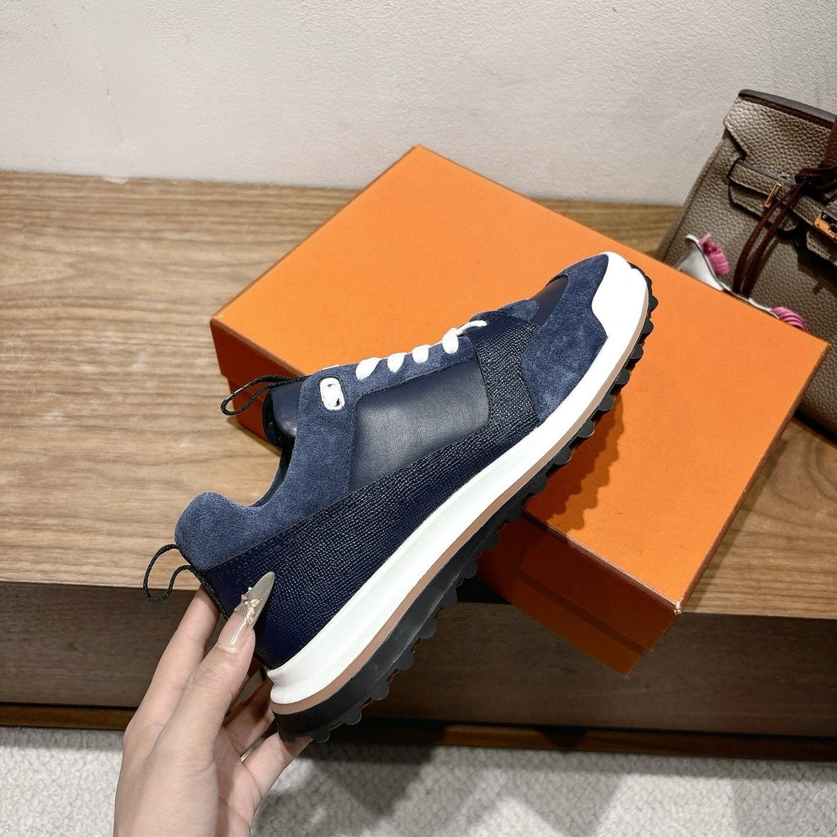 Hermès Paneled Low-Top Sneakers — side