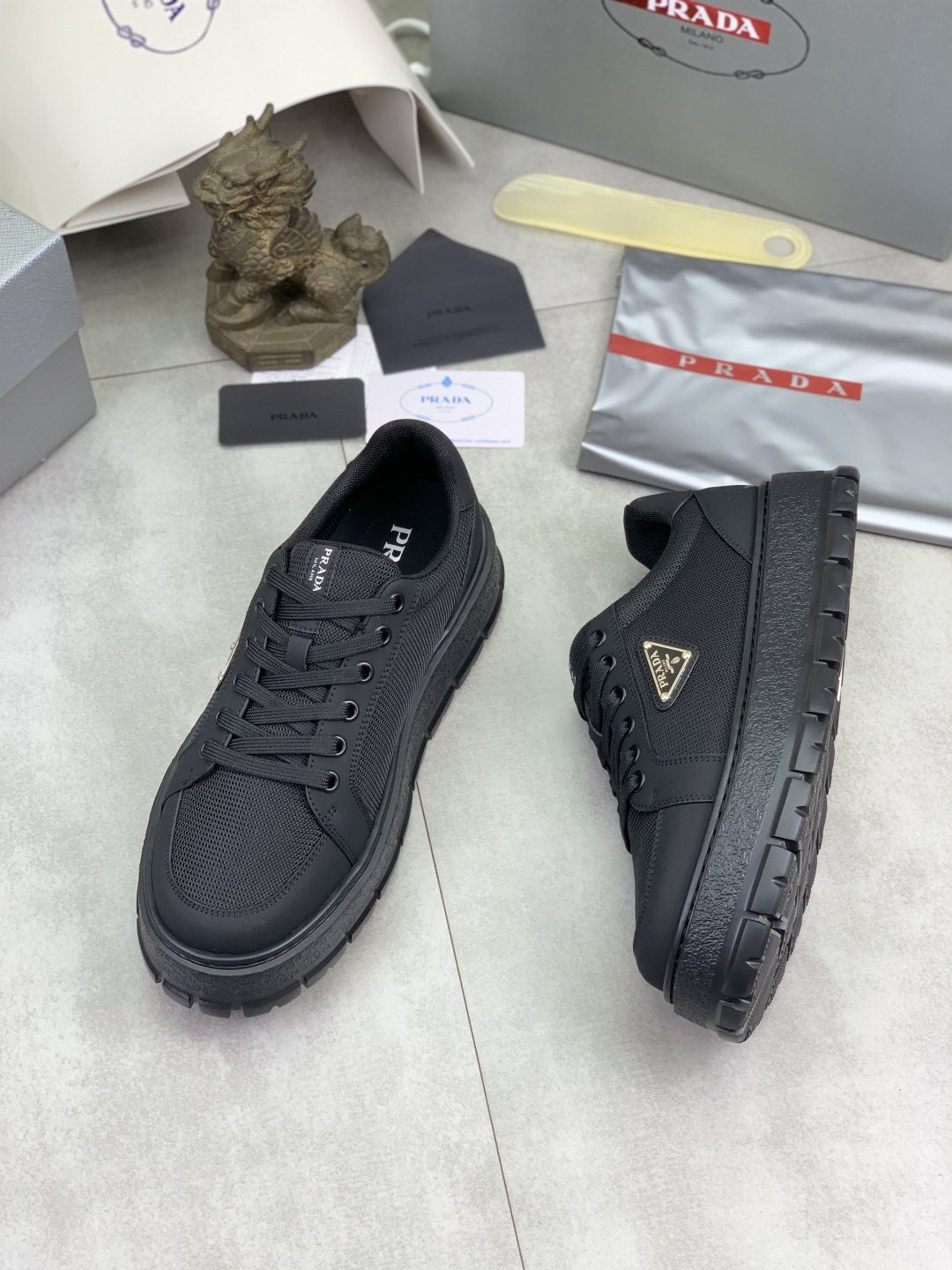 Prada Paneled Lug-Sole Sneakers — front