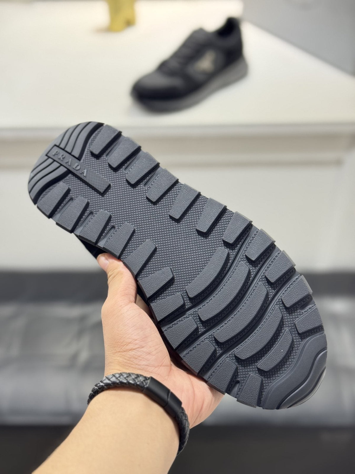 Prada Paneled Chunky-Sole Sneakers — detail
